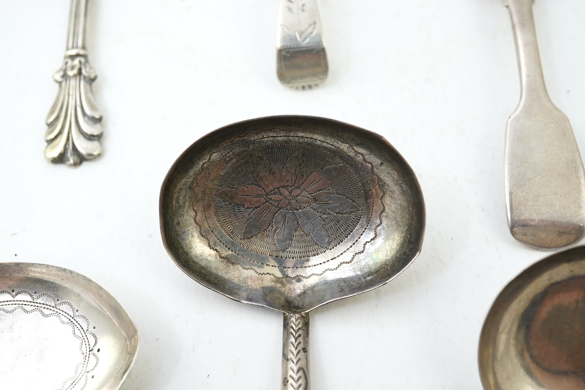 Ten assorted 19th century silver caddy spoons